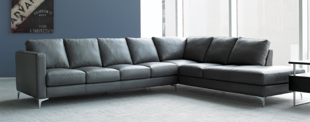 dark gray wrap around couch in a brightly lit living room