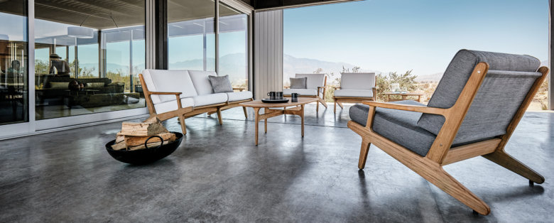 Gloster outdoor furniture with a mountain range in the background