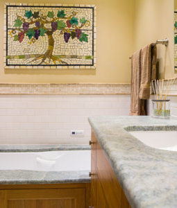 detail of a beautiful bathroom, looking at the tub over the sink